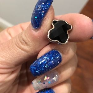 Tous black onyx earring.